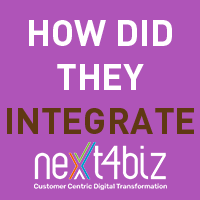 Which systems became integrated into next4biz?