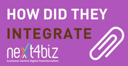Which systems became integrated into next4biz?